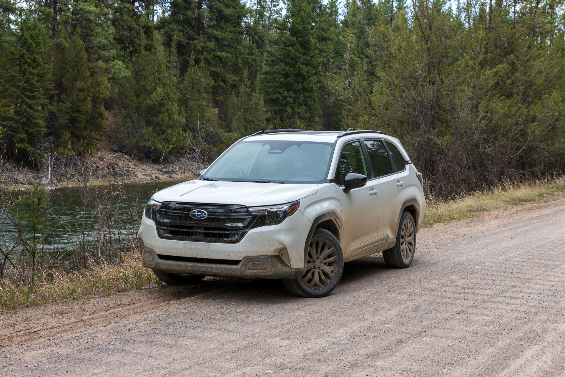 photo of 2025 Subaru Forester on dirt trail with bikes loaded