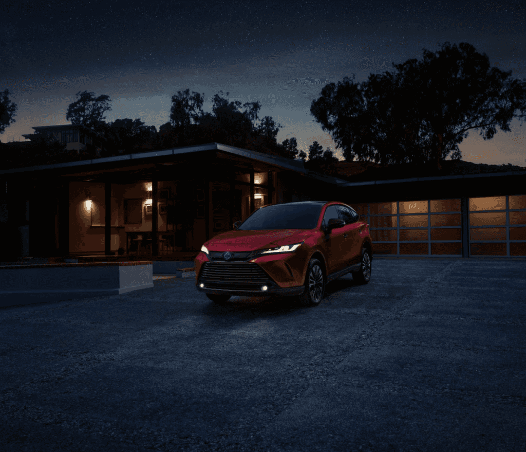 photo of 2025 Toyota Venza driving at dusk